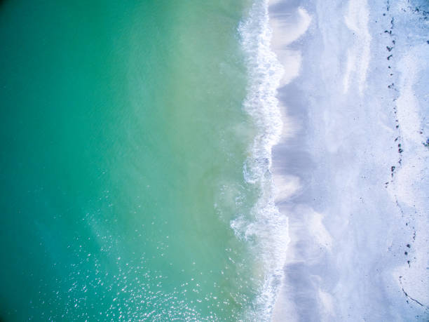 istock Aerial View of Waves and Surf 1084102882