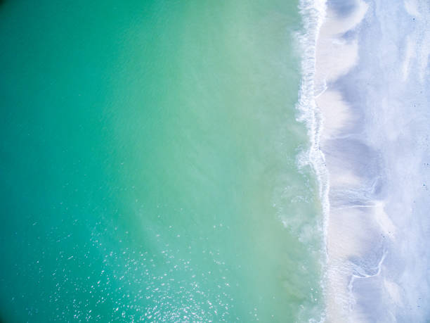 istock Aerial View of Waves and Surf 1084102894