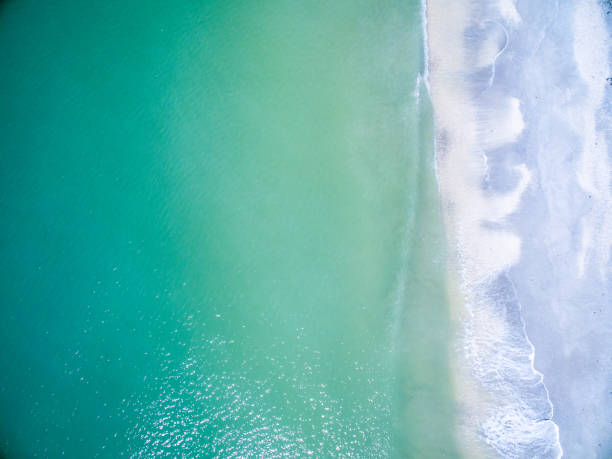 istock Aerial View of Waves and Surf 1084102948