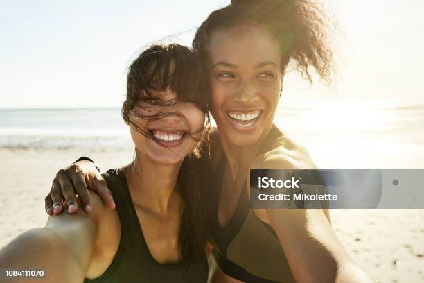 We Cant Help But Feel Great Stock Photo - Download Image Now - Friendship, Women, Beach