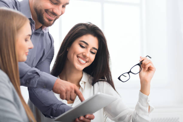 istock Corporate business colleagues working together in office 1084111504