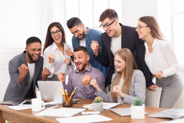 istock Success and team work. Business partners celebrating breakthrough 1084111522