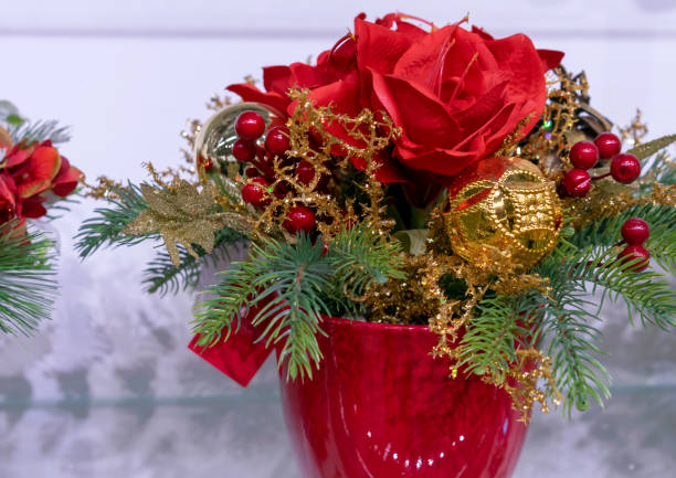 istock Christmas composition with flowers, berries and decorations. 1084112154