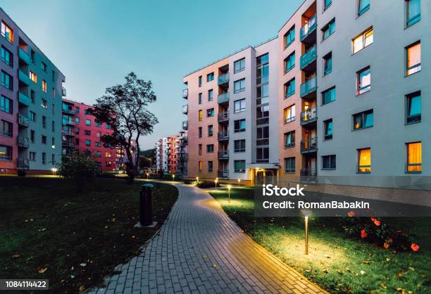 Apartment Modern Houses Homes Residential Buildings Real Estate Outdoor Evening Stock Photo - Download Image Now