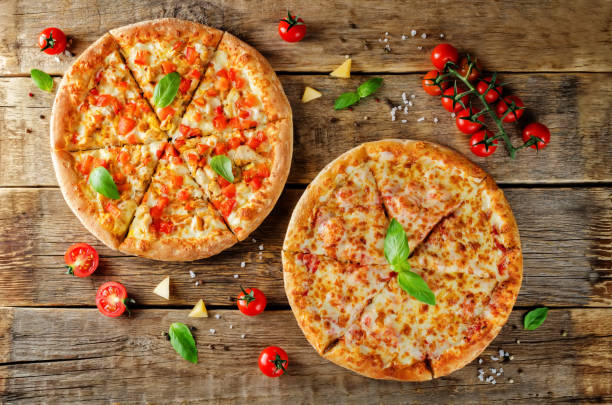 istock Pizza with cheese, chicken and fresh tomato slices 1084119486