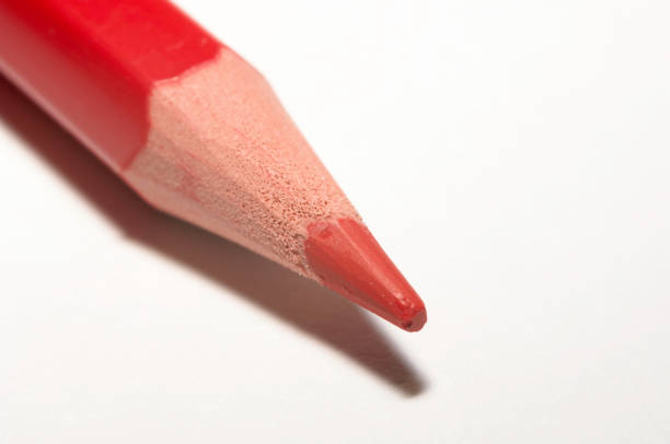 Red  pencil isolated on white background. Pencil is red in color. Clipping path is included,