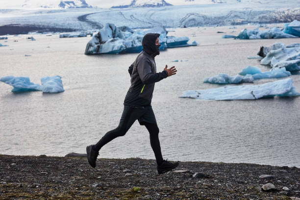 istock Jogging on a black beach. Glacier lagoon 1084125276