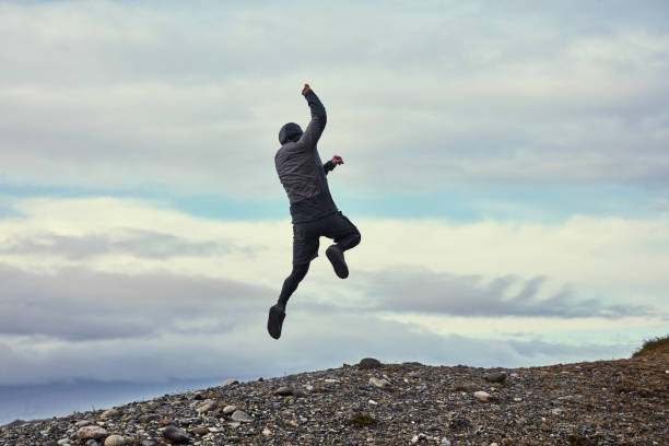 istock Jumping on a black beach. Glacier lagoon 1084125396