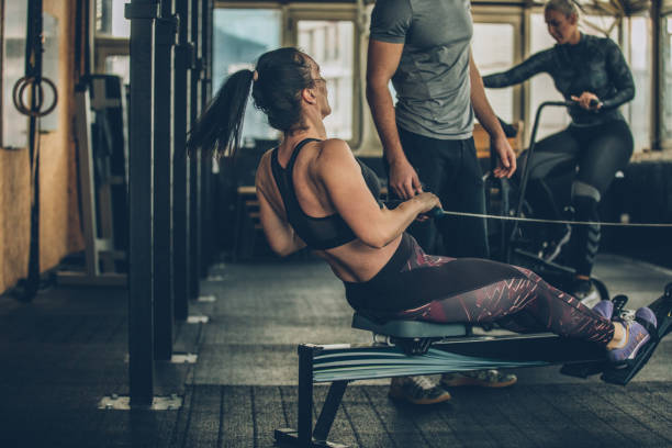 istock Women training hard in gym 1084128030