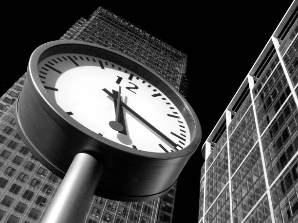 London, UK, September 26, 2009 :  Black and white image of  Time is Money in Canary Wharf which is the largest business development in East London built on the site of the old West India Docks on the Isle Of Dogs