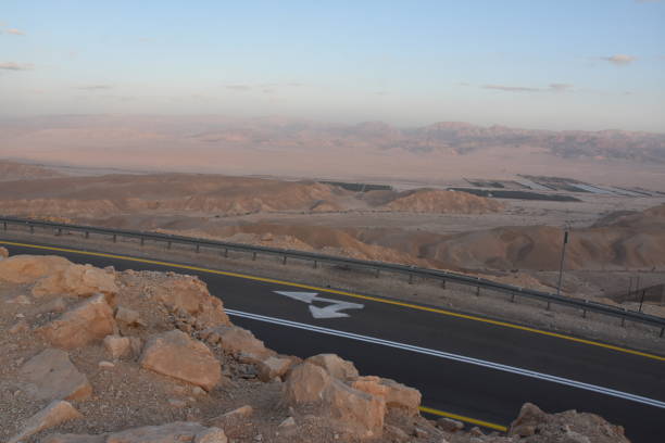 istock A winding road with safety railing 1084139576