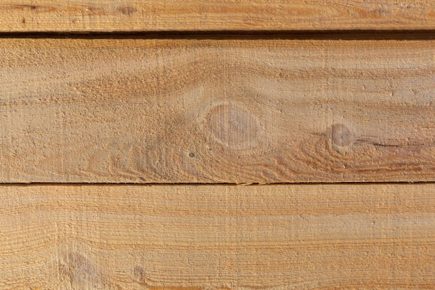 Close view of rough sawn lumber Close view of the surface of rough sawn lumber. roughhewn stock pictures, royalty-free photos & images