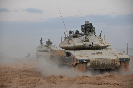 Sde Boker, Israel: December 17, 2018:In the picture you can see the new Israeli tank - Merkava Mark 4 . Merkava Mark 4 is the fourth and most advanced model of the Merkava tank. The photograph was taken on Road 40, 5 minutes drive north of Sde Boker