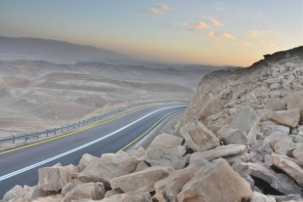 istock A winding road with safety railing 1084150416