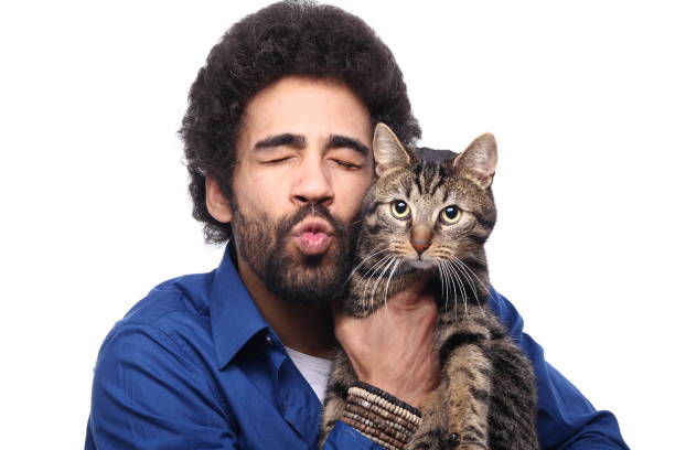 Beautiful afro man with a cat