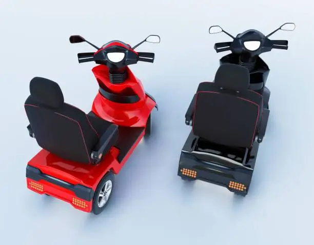 Photo of Black and red mobility scooters against white background