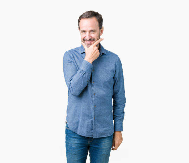istock Handsome middle age elegant senior man over isolated background looking confident at the camera with smile with crossed arms and hand raised on chin. Thinking positive. 1084162644
