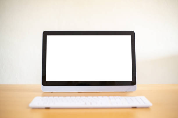 istock Workspace and blank screen desktop computer.Mockup desktop computer, and home office on wooden desk,copy space. 1084168922
