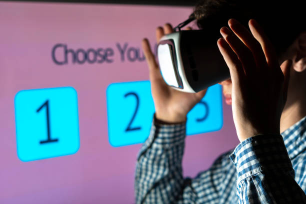 istock young man in vr glasses playing games  d 1084172420