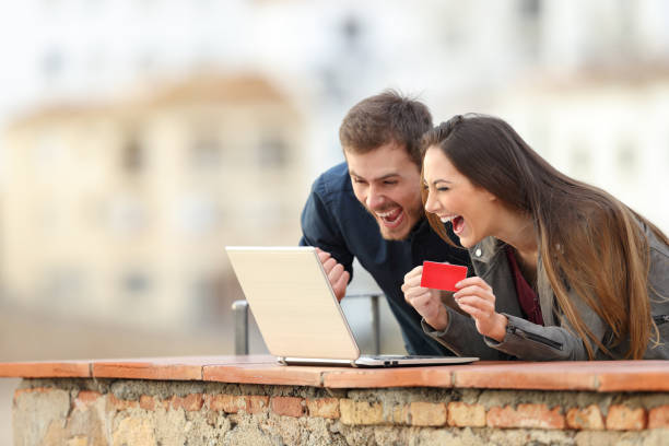 Excited online shoppers finding offers on vacation