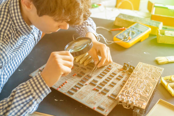 istock man engineer repair computer board in the workshop f 1084175182