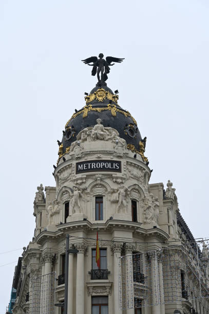 Madrid Metropolis building on the corner of Alcala street and the Gran Via urban sprawl stock pictures, royalty-free photos & images