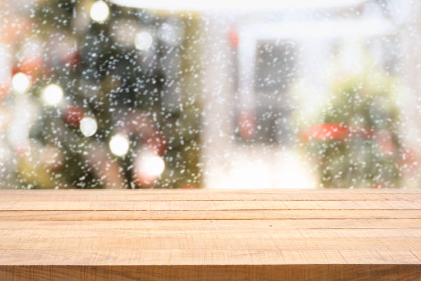 istock Empty wooden table and decorated christmas tree, Xmas. 1084186280