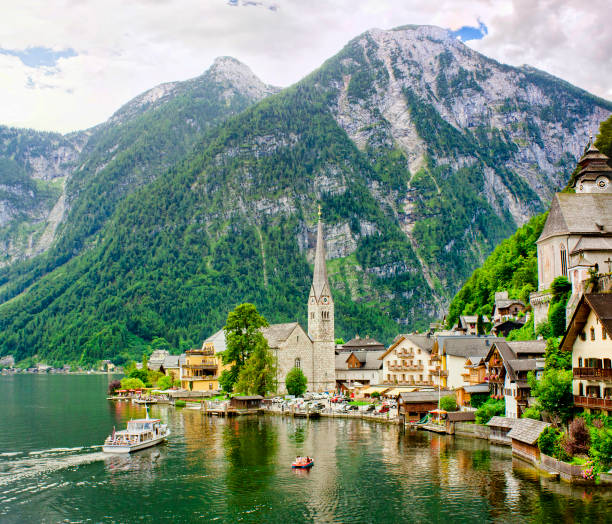 istock Hallstatt, mountain lake and touristic boat 1084189442