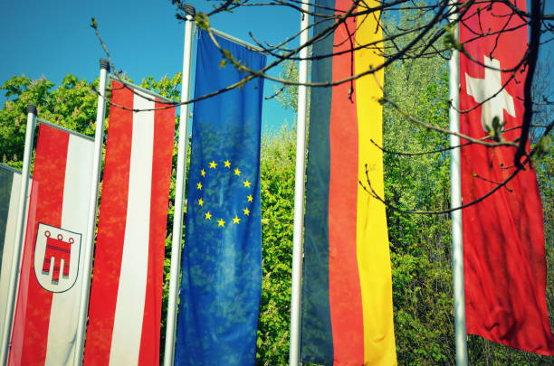 Flags of the Longer Austria, Switzerland, Germany, as well as flag of the European Union. Photographed in front of the Bregenz Festspielhaus. Economic and cultural cooperation at the dreiländer-Eck.