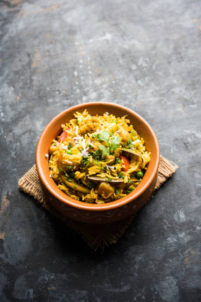 istock Masala Rice or masale bhat - is a spicy vegetable fried rice / biryani or Pulav usually made during wedding occassions in maharashtra, India 1084191480