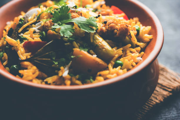istock Masala Rice or masale bhat - is a spicy vegetable fried rice / biryani or Pulav usually made during wedding occassions in maharashtra, India 1084191510