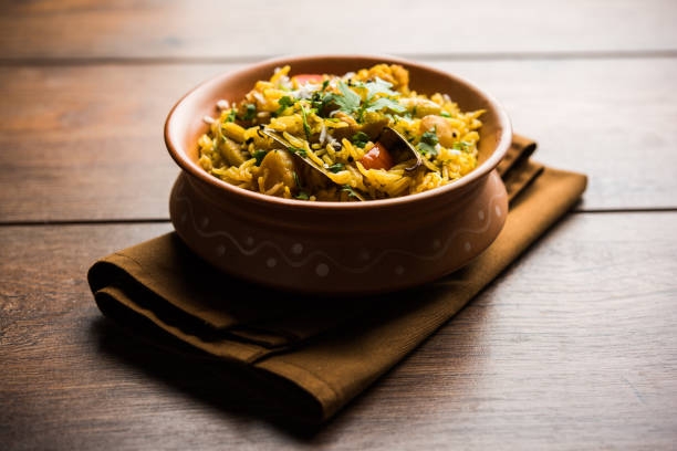 istock Masala Rice or masale bhat - is a spicy vegetable fried rice / biryani or Pulav usually made during wedding occassions in maharashtra, India 1084192784