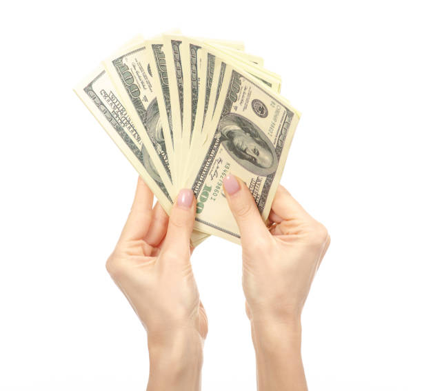 istock Money dollars in hands 1084192888