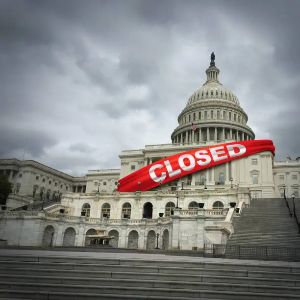 USA shutdown and United States government closed and american federal shut down due to spending bill disagreement between the left and the right pas a national finance symbol with 3D illustration style.