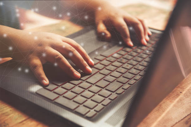 istock Children's hand playing on screen laptop computer with social media network 1084193568