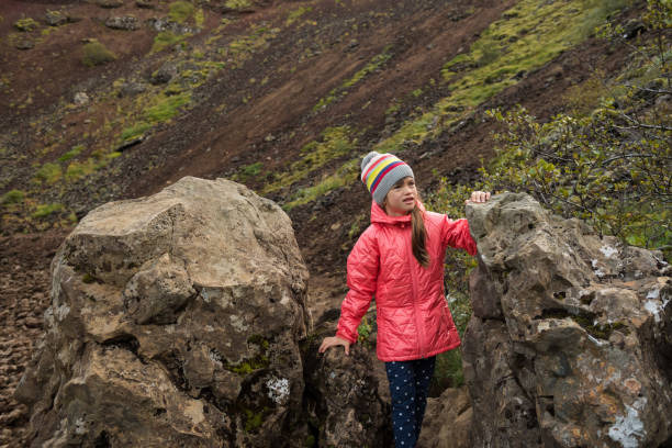 istock Girl exploring natures beauty 1084196180
