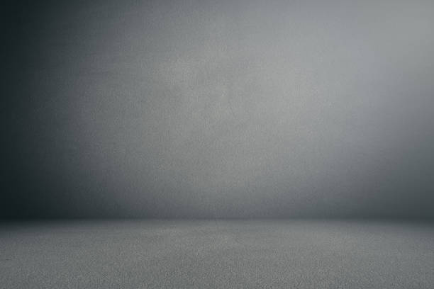 istock cement floor and wall backgrounds, dark room, interior, display product. 1084196446