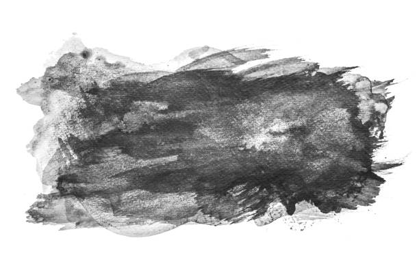 istock Black watercolor splashing on white background, hand paint on paper. 1084196644