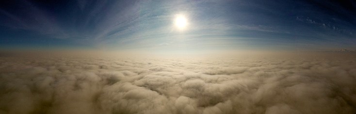 panoramic view of a foggy day from a plane
