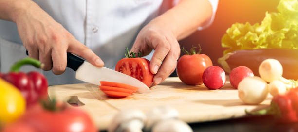istock Chef prepares fresh vegetables. Healthy nutrition 1084196872