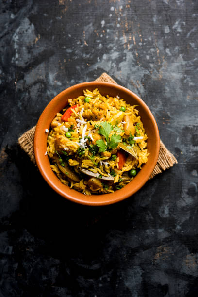 Masala Rice or masale bhat - is a spicy vegetable fried rice / biryani or Pulav usually made during wedding occassions in maharashtra, India