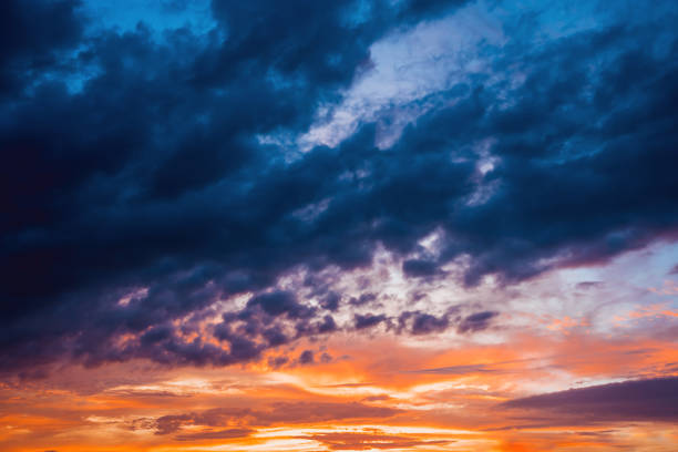 istock dramatic sky with clouds sunset evening twilight in rural 1084200028