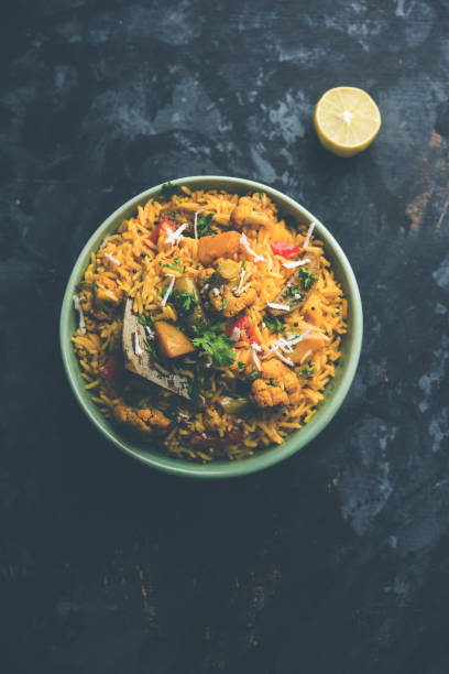 istock Masala Rice or masale bhat - is a spicy vegetable fried rice / biryani or Pulav usually made during wedding occassions in maharashtra, India 1084200170