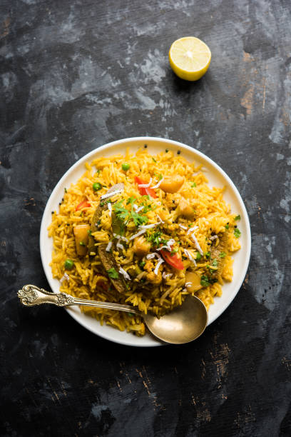 istock Masala Rice or masale bhat - is a spicy vegetable fried rice / biryani or Pulav usually made during wedding occassions in maharashtra, India 1084200534