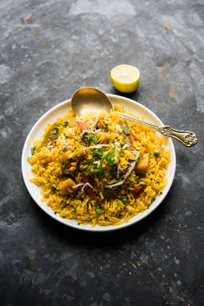 istock Masala Rice or masale bhat - is a spicy vegetable fried rice / biryani or Pulav usually made during wedding occassions in maharashtra, India 1084201366