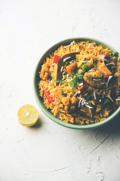 istock Masala Rice or masale bhat - is a spicy vegetable fried rice / biryani or Pulav usually made during wedding occassions in maharashtra, India 1084201870