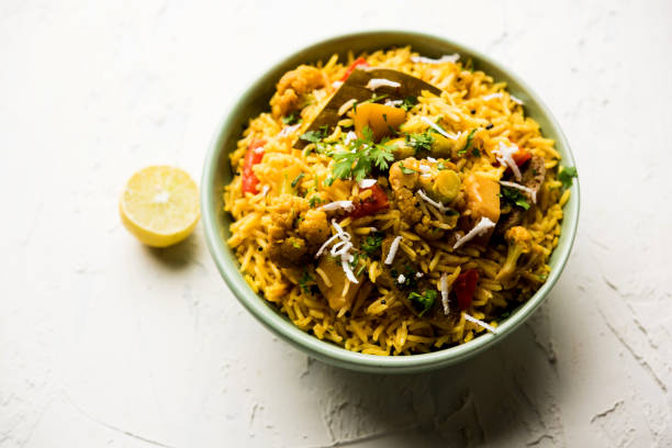 istock Masala Rice or masale bhat - is a spicy vegetable fried rice / biryani or Pulav usually made during wedding occassions in maharashtra, India 1084201878