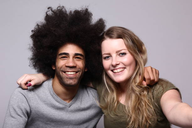 istock Afro man and caucasian woman 1084206308