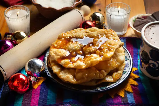 Authentic mexican buñuelos with piloncillo syrup