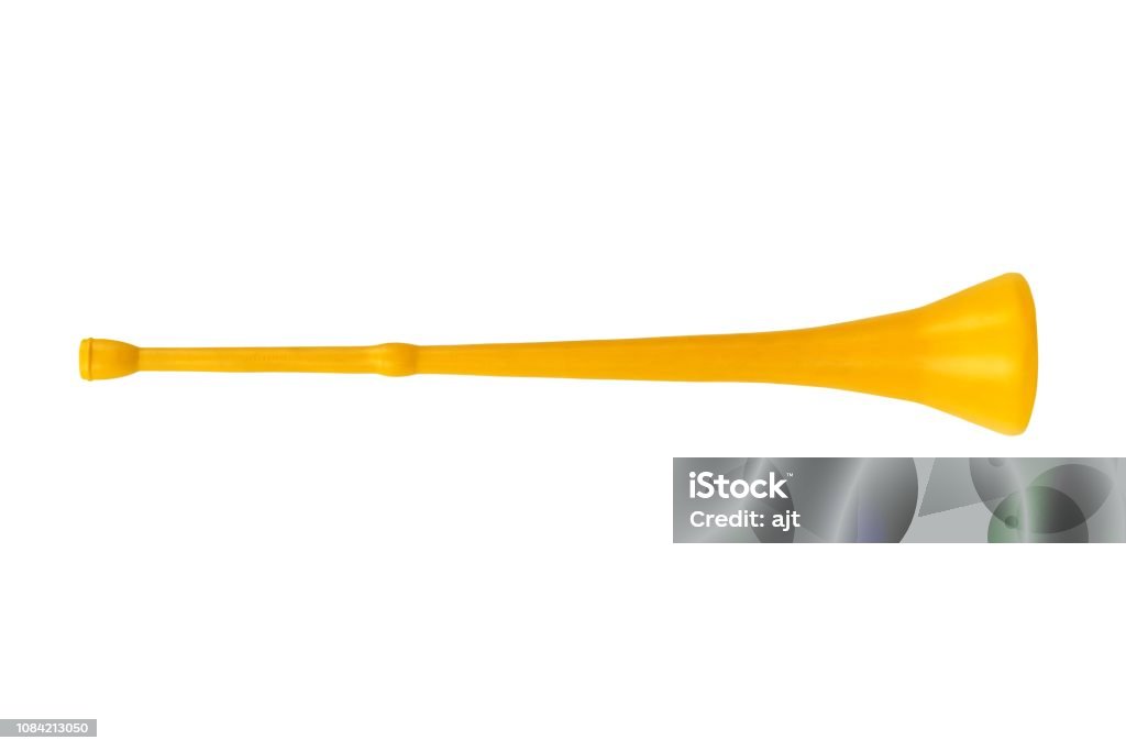 Vuvuzela on white Yellow vuvuzela horn isolated on white background Vuvuzela Stock Photo